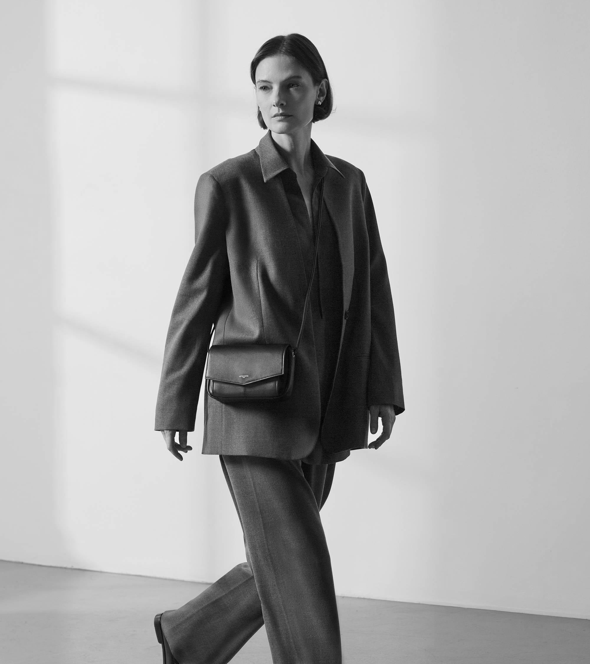 Charlotte smooth leather clutch bag with removable shoulder strap